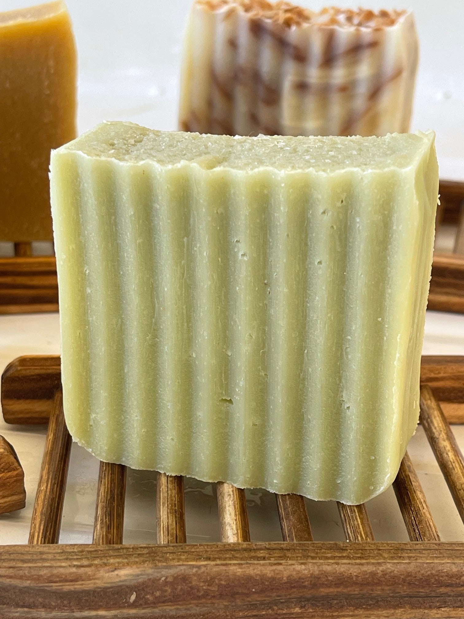 Castille Bar Soap on wooden soap dish